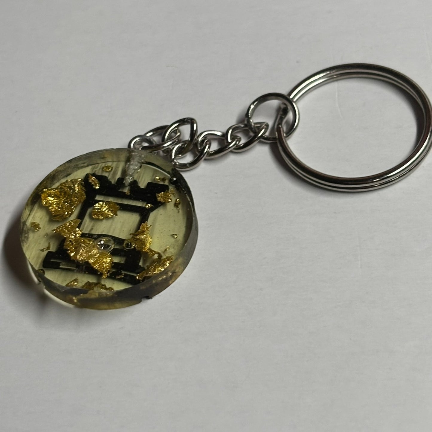 The Rook's Golden Particles - Handmade Resin Keychain - Flat Edition